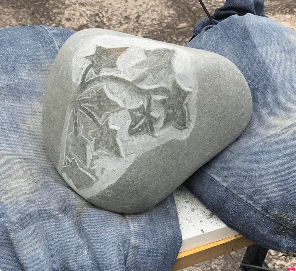 Carving of ivy on stone